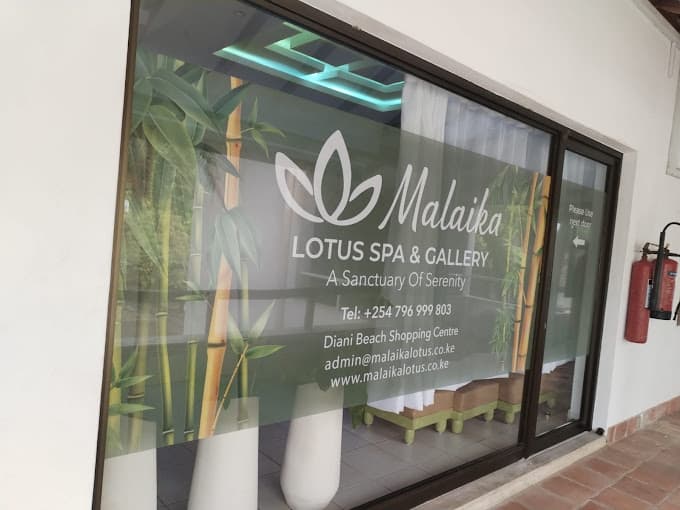 Exterior window signage for Malaika Lotus Spa and Gallery in Diani Beach